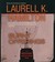 Burnt Offerings by Laurell K. Hamilton