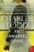 Unmarked Grave, An: A Bess Crawford Mystery (Paperback)