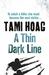 A Thin Dark Line. Tami Hoag (Paperback)