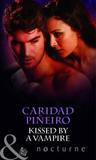 Kissed by a Vampire. Caridad Pieiro