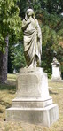 This monument is the James Wynne Jones Family Monument at Spring Grove Cemetery in Cincinnati. The woman is holding an anchor under her cloak.