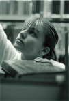 "A Reach for Knowledge" by Susan Matsubara. First place in the adult category of the 1999 Beyond Words photo contest at the Lexington Public Library and winner of the American Library Association President's Prize at the national level. Photo taken at the Lexington Public Library's Beaumont Branch.
