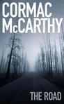 What is the relationship between the two people walking the road in [a:Cormac McCarthy|4178|Cormac McCarthy|http://photo.goodreads.com/authors/1200429153p2/4178.jpg]'s <i>[b:The Road|6288|The Road|Cormac McCarthy|http://ecx.images-amazon.com/images/I/21E8H3D1JSL._SL75_.jpg|3355573]</i>?
